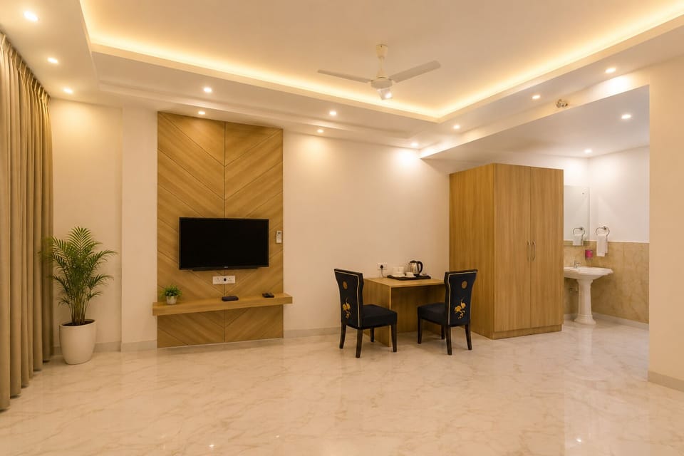 Superior Double Room | Living area | 32-inch Smart TV with cable channels, fireplace