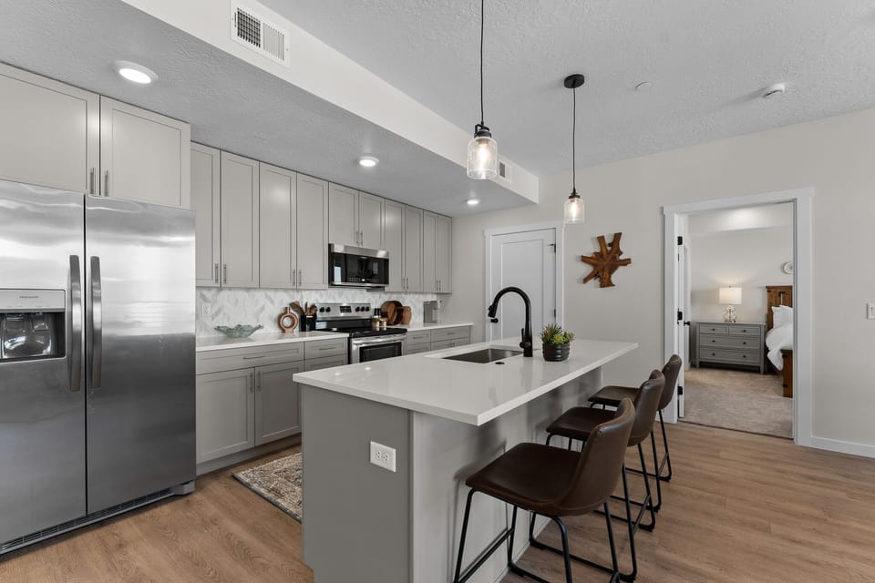 Condo, 2 Bedrooms | Private kitchen | Fridge, oven, coffee/tea maker, electric kettle