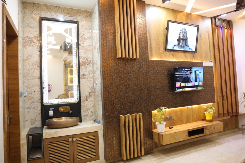 43-inch LED TV with digital channels, books