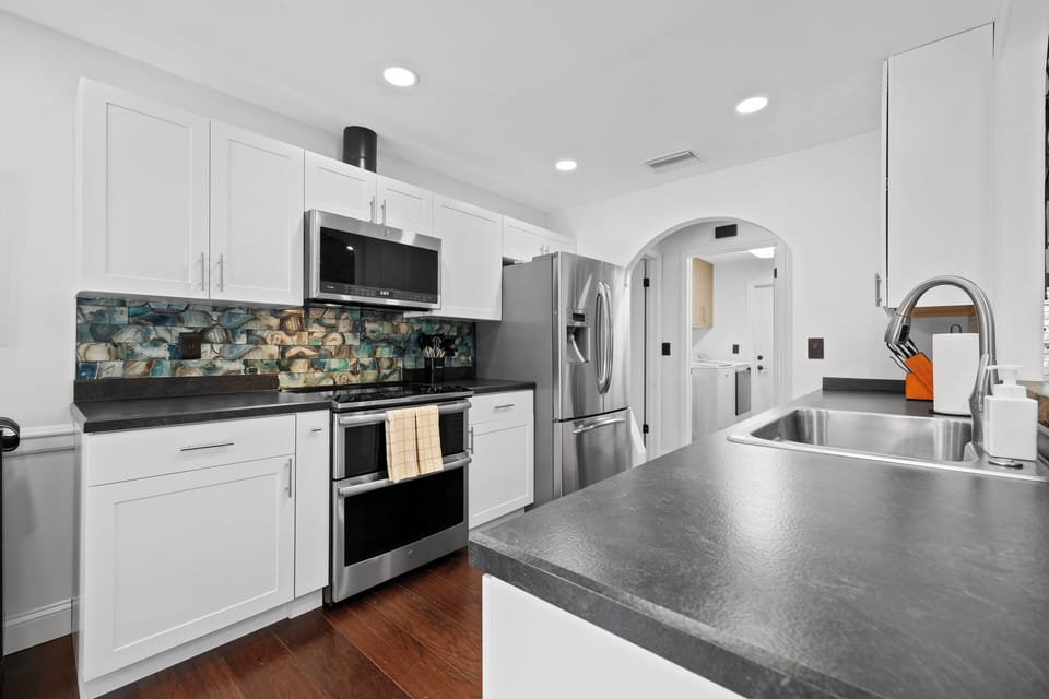 Kitchen fully equipped with modern appliances