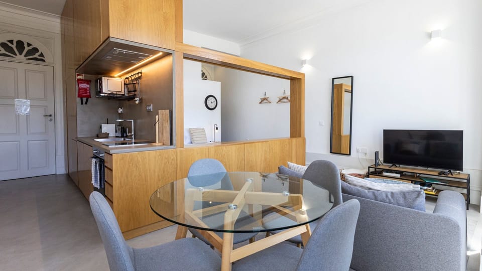 Charming dining area with seating for four, offering a comfortable space for shared meals #stunning #pratical