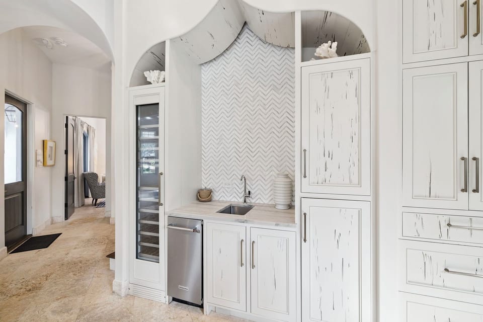 Prep Your Favorite Cocktails at the Wet Bar - Offering a Wine Cooler & Ice Maker