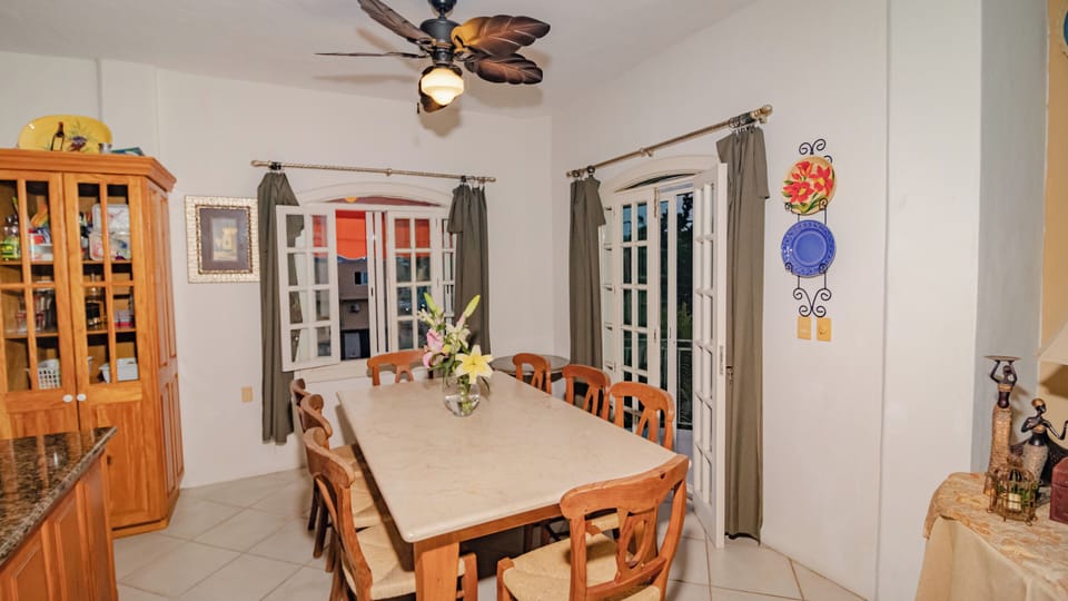 Deluxe Quadruple Room, Balcony, Partial Ocean View | Living area