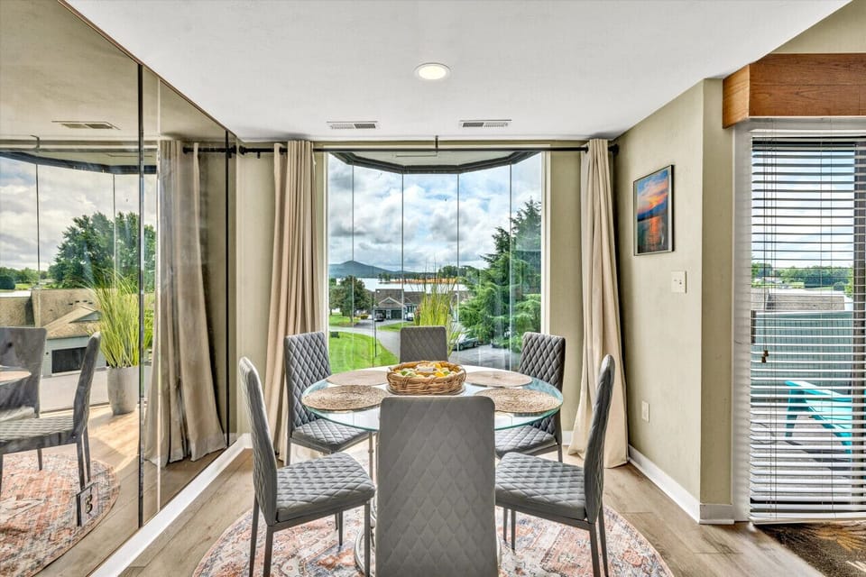 Savor your meals in a bright dining area with a view and ample seating for everyone.