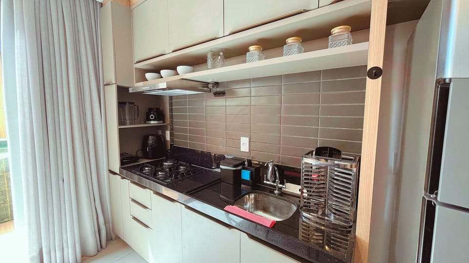 Luxury Apartment | Private kitchen | Full-size fridge, microwave, stovetop, cookware/dishes/utensils