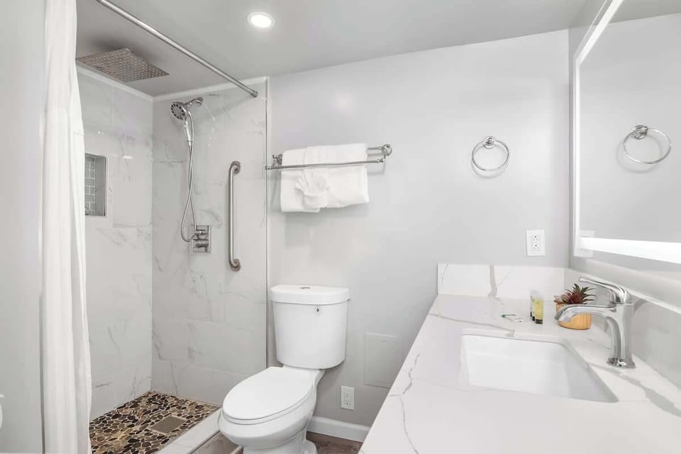Refreshed in your bathroom with a walk-in shower.