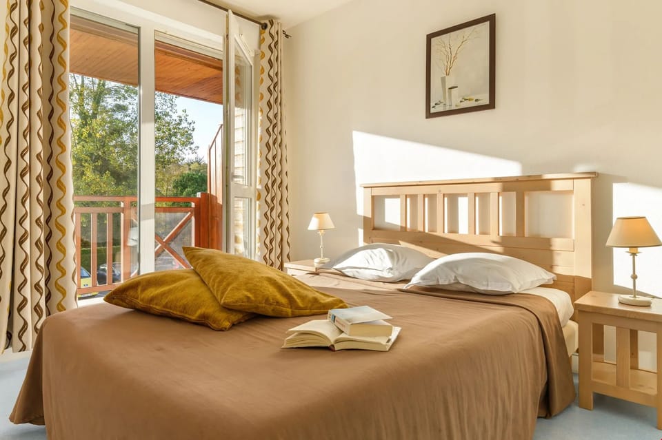 Relax on the luxurious bed after a day outside.
