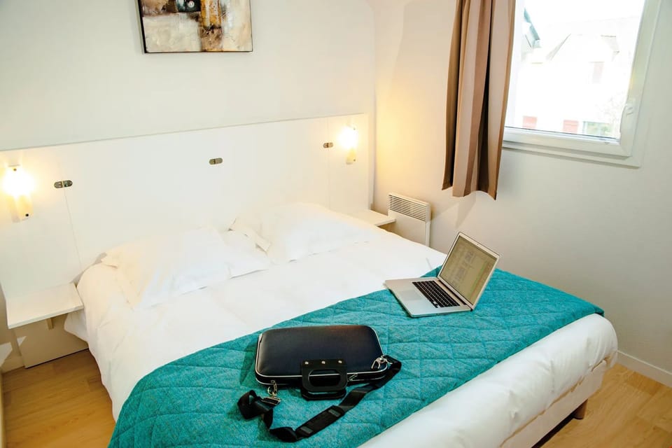 Get a peaceful night sleep in our cozy bedroom.