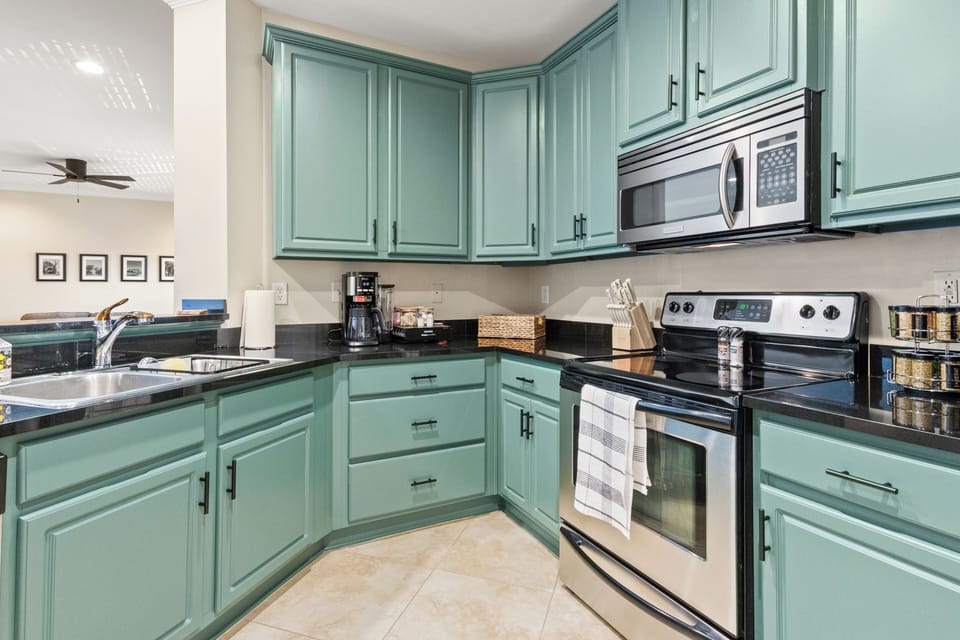 Large Kitchen fully stocked with cooking supplies.