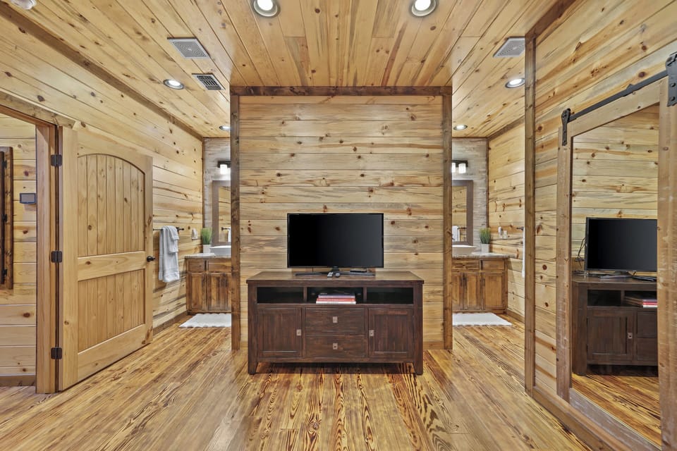 Of course, the primary bedroom has a Smart TV so you can curl up with your favorite movies.