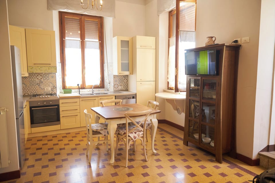 Appartamento Tina con Terrazza Privata | Private kitchen | Mini-fridge, microwave
