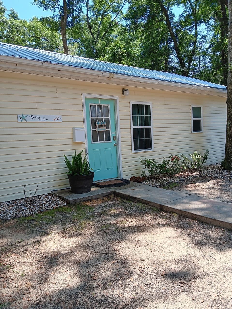 Front door in private backyard space.