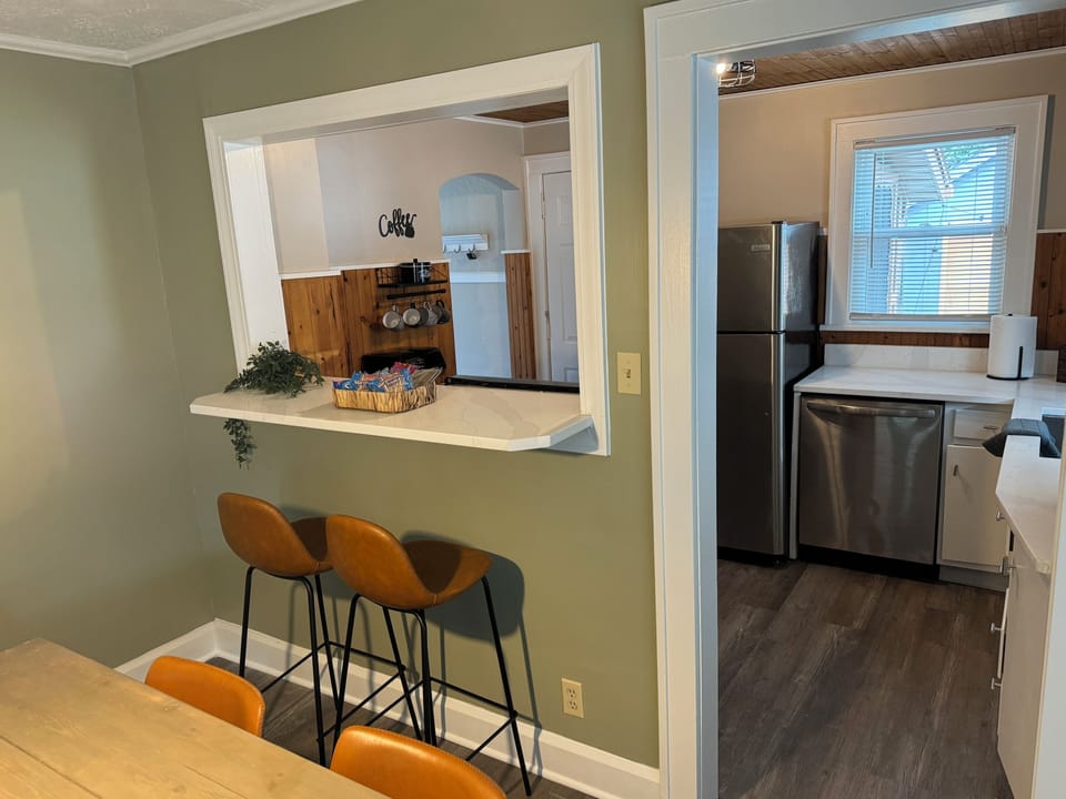 Cozy Dining Nook – Natural light and comfy seating for breakfast or happy hour.