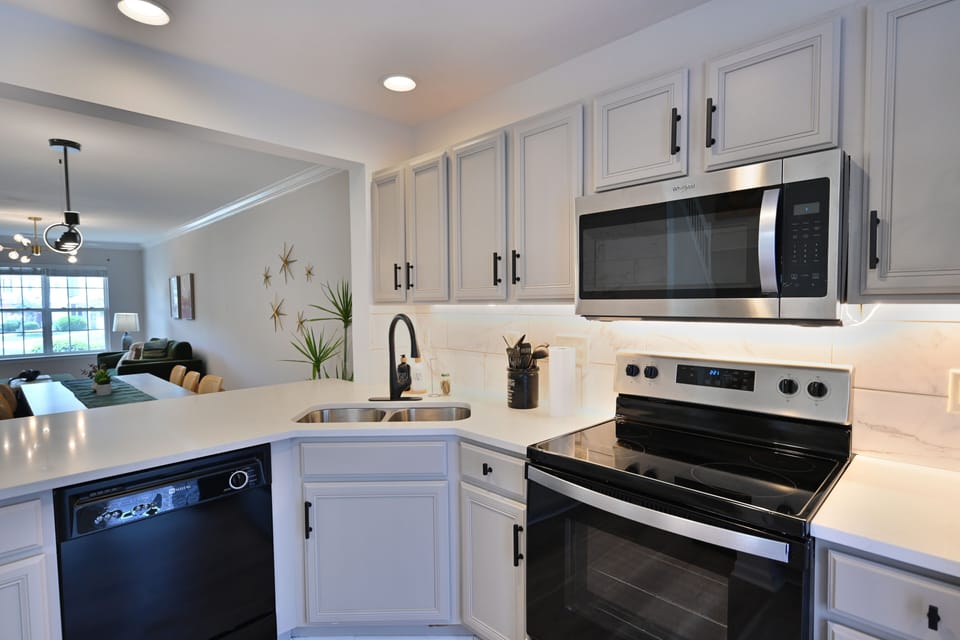 Full kitchen with stainless steel appliances
