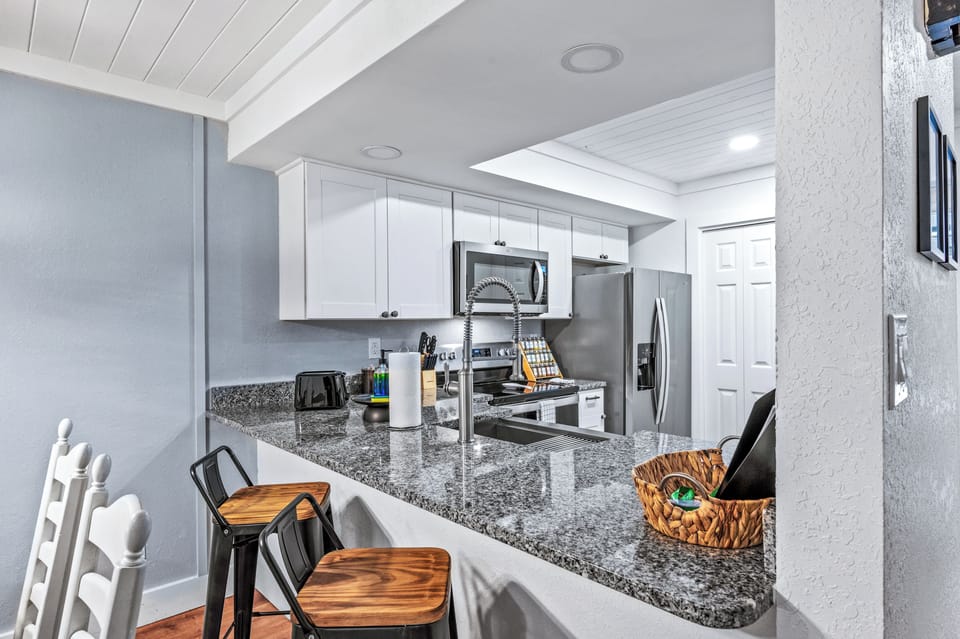 Granite countertops and stainless steel appliances