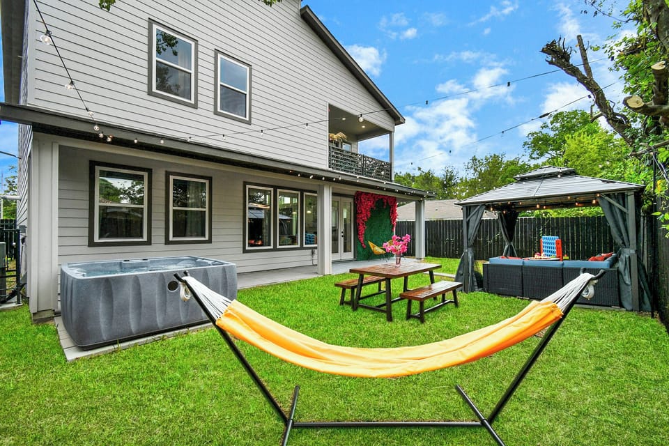 Outdoor Oasis: Relax in the hammock or unwind in the hot tub under twinkling lights!