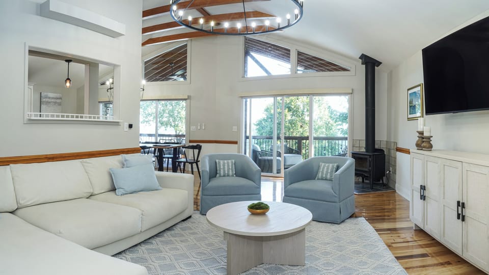 Step into this stunning living room with triple pane slider windows