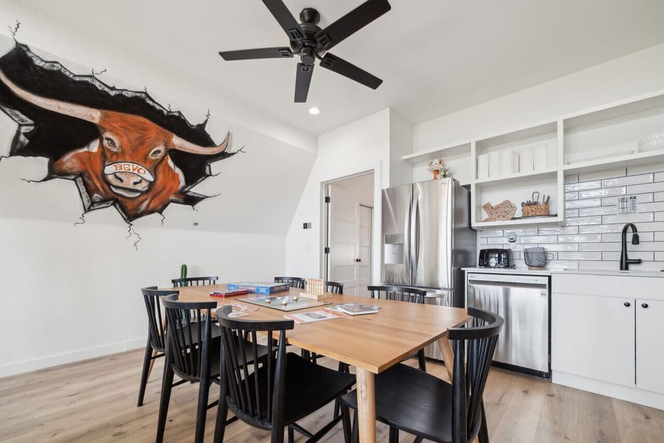 Dining area featuring Bevo mural