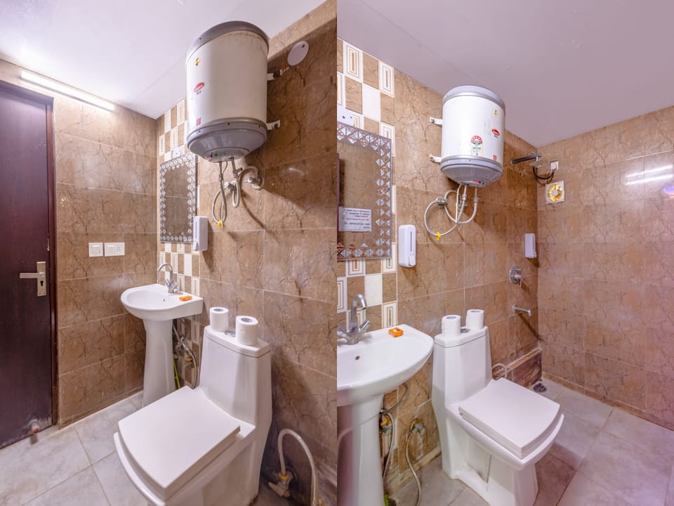 Shower, towels, toilet paper