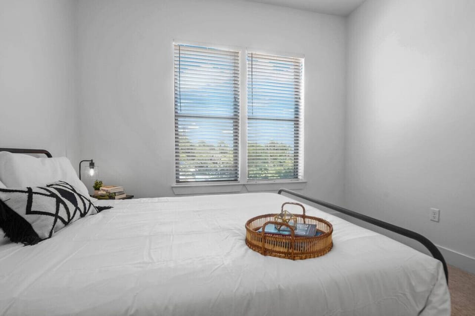 As you enter the bedroom, the comfortable bedding and peaceful atmosphere create the perfect retreat from the day.