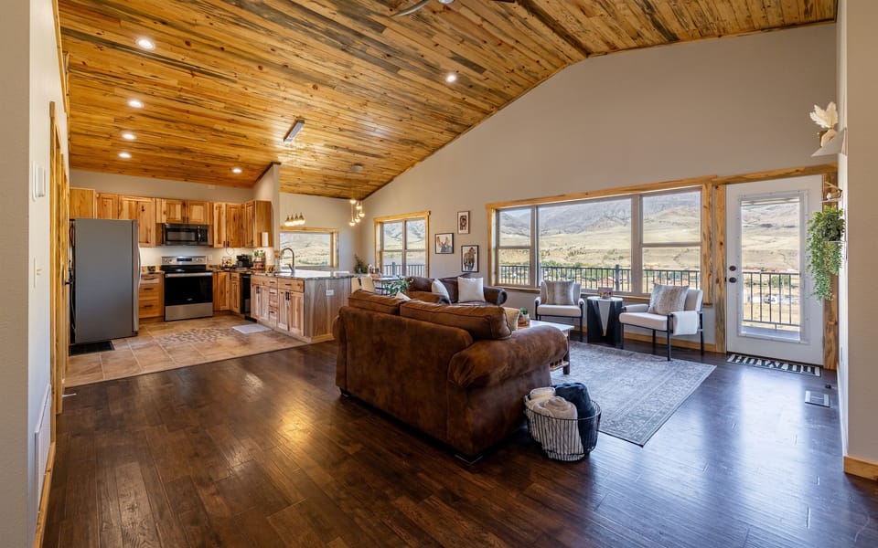 Step into our airy open concept living area, where natural light floods in, creating a welcoming space for relaxation and entertainment.