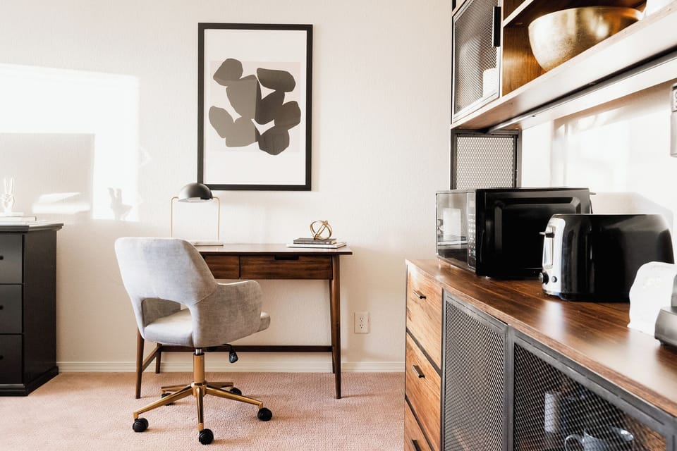 Desk and chair, perfect for remote workers needing a quiet, comfortable stay.