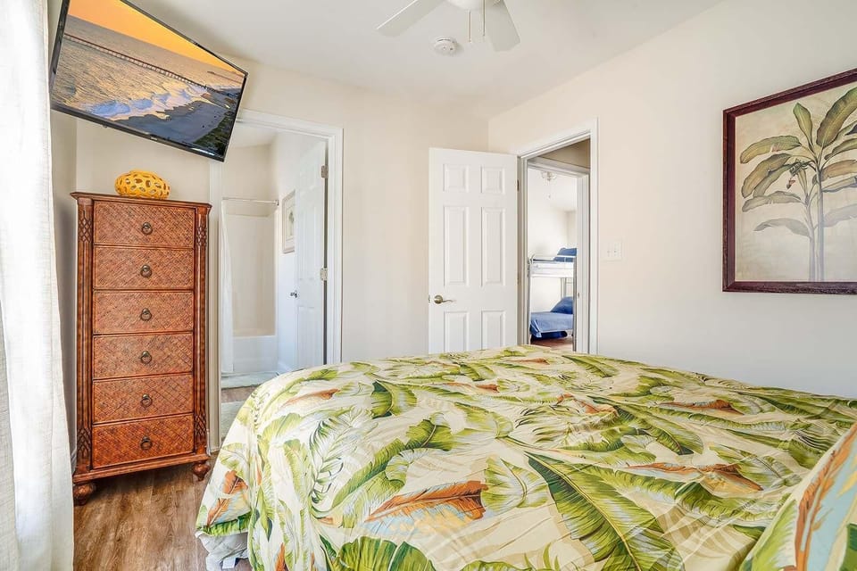Cozy bedroom with tropical decor and natural light