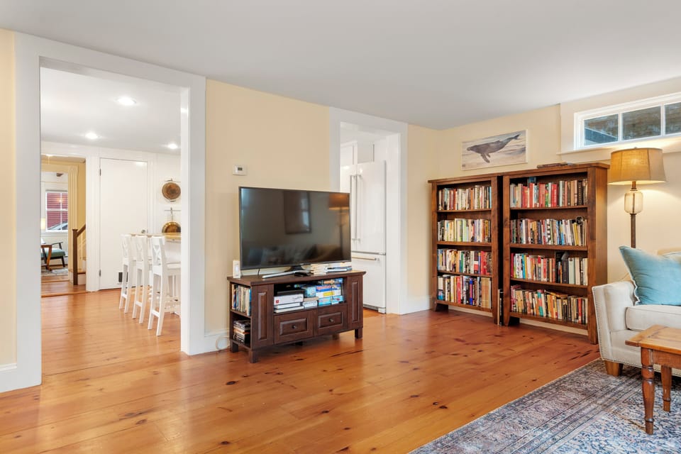 This living room connects to the kitchen, perfect for entertaining!