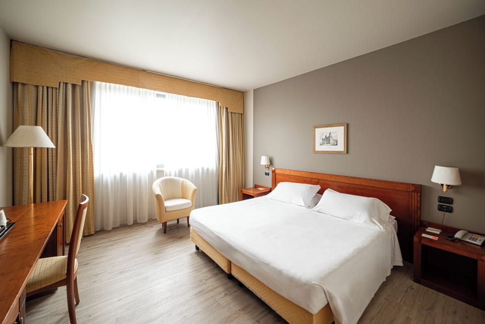 Superior Double Room | 1 bedroom, down comforters, minibar, in-room safe