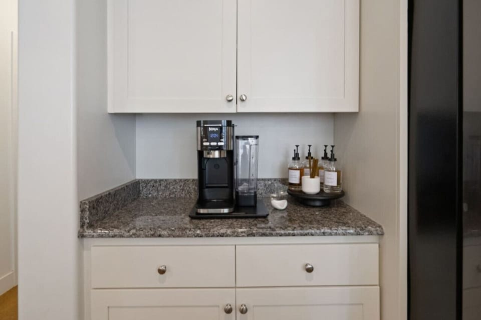 Coffee bar equipped with k-cups, teas, sugars, syrups