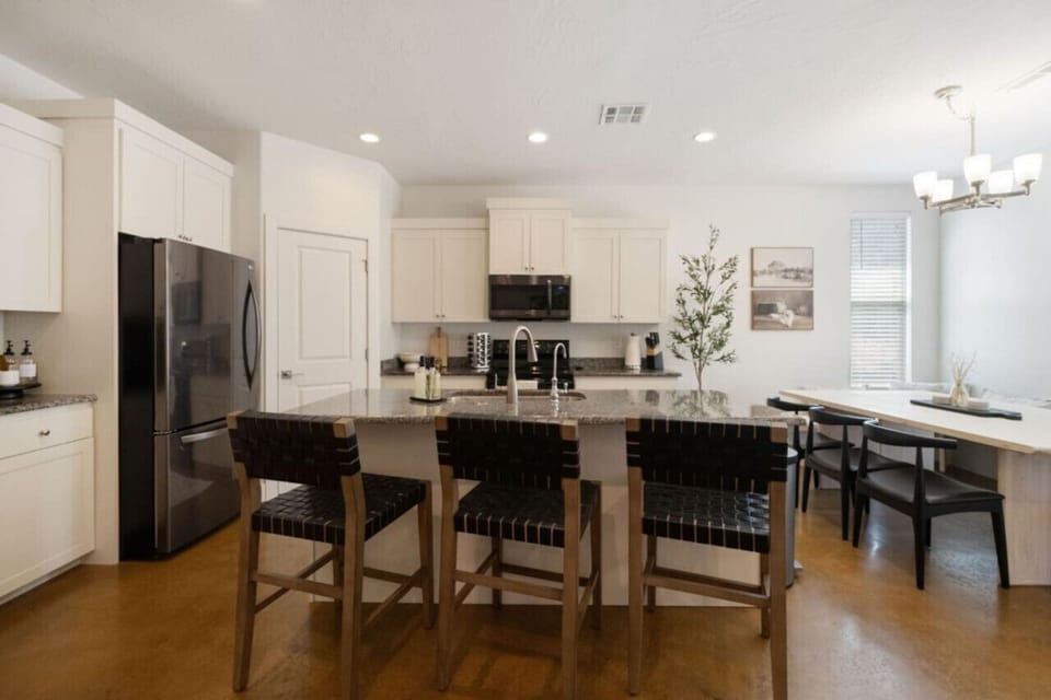 Large island, coffee bar with k-cups, teas, sugar, various syrups, blender, ice maker, filtered water, electric kettle, everything you need to cook