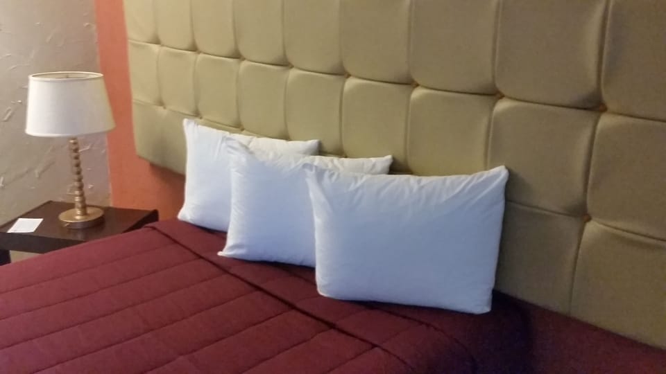 Standard Room, 1 Queen Bed (Cruise Only) | Blackout drapes, free WiFi, bed sheets