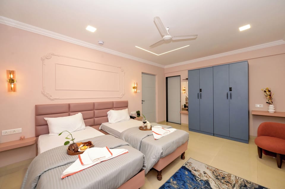 Deluxe Twin Room, Balcony, City View | Individually decorated, individually furnished, desk, laptop workspace