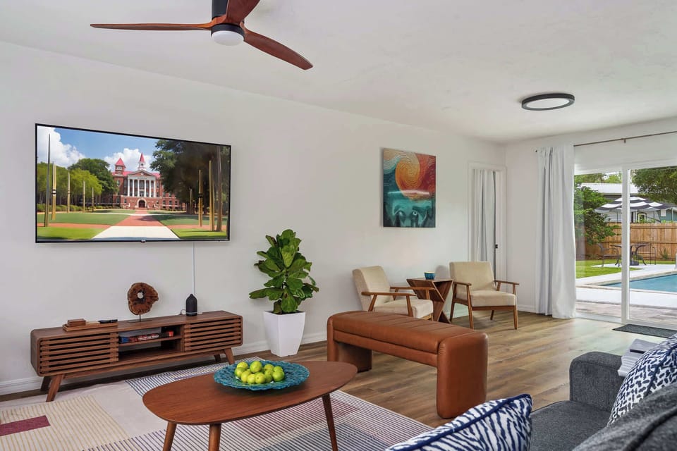 Kick back in our thoughtfully designed lounge. Featuring high-end MCM decor, high-speed streaming, and direct access to the outdoor patio and pool, it’s the heart of your home away from home.