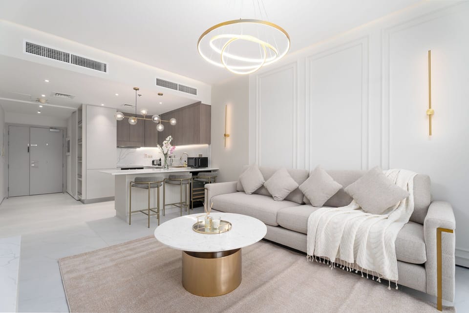 Deluxe Apartment, Balcony, Marina View | Living area | 55-inch Smart TV with cable channels
