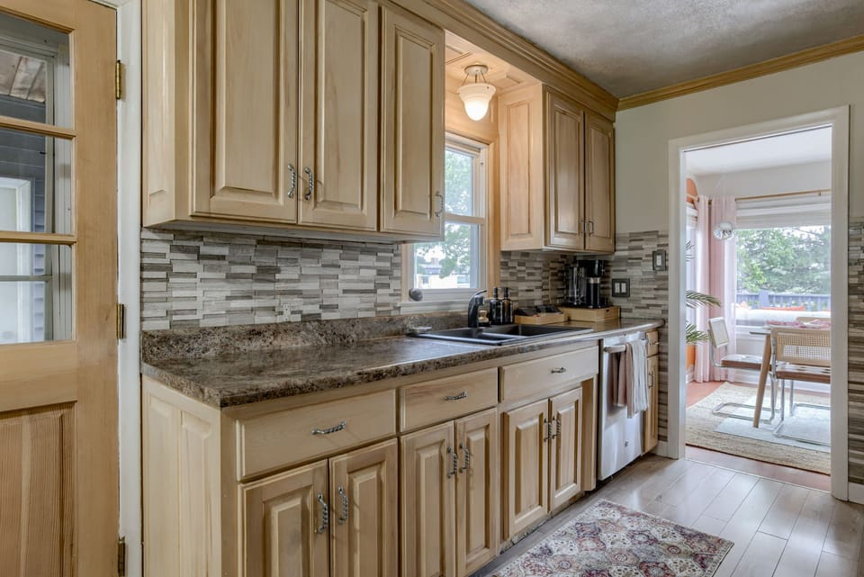 Full kitchen with granite countertops and oakwood cabinets