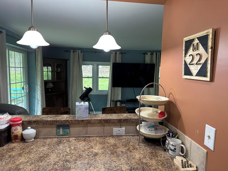 Overlook to front room from kitchen.
