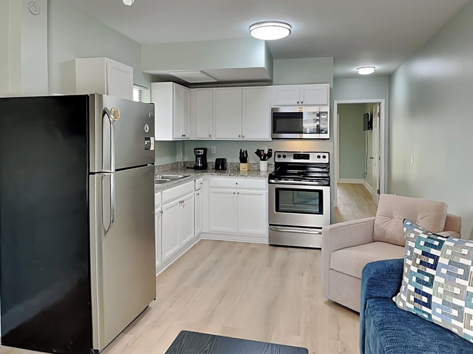Condo, 1 King Bed with Sofa bed, Patio, Garden View (PC Beach Retreat A - No Pets Allowed) | Private kitchen | Fridge, microwave, oven, stovetop