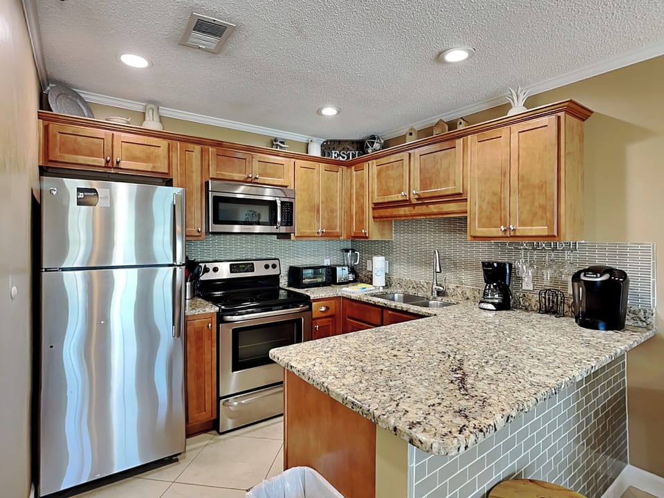 Condo, Multiple Beds, Balcony (Grand Caribbean#309  - No Pets) | Private kitchen | Fridge, microwave, oven, stovetop