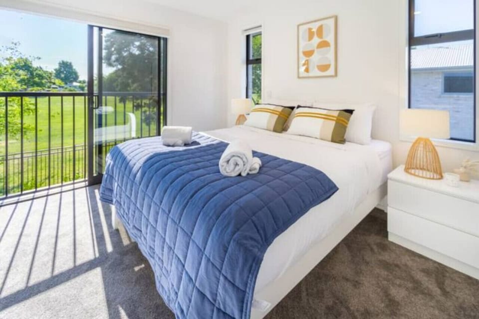 Comfortable bedroom with a beautiful balcony view