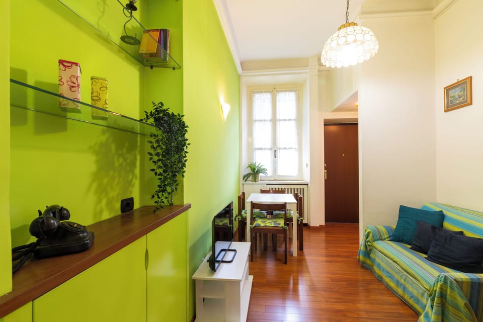 Classic Apartment | Living area | 32-inch flat-screen TV with digital channels