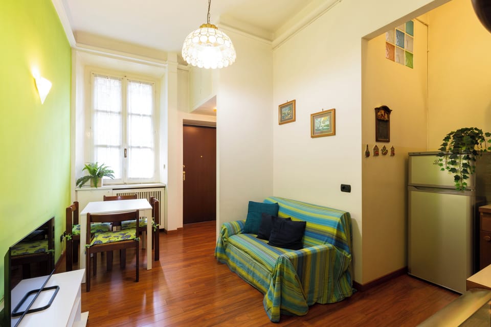 Classic Apartment | Living area | 32-inch flat-screen TV with digital channels