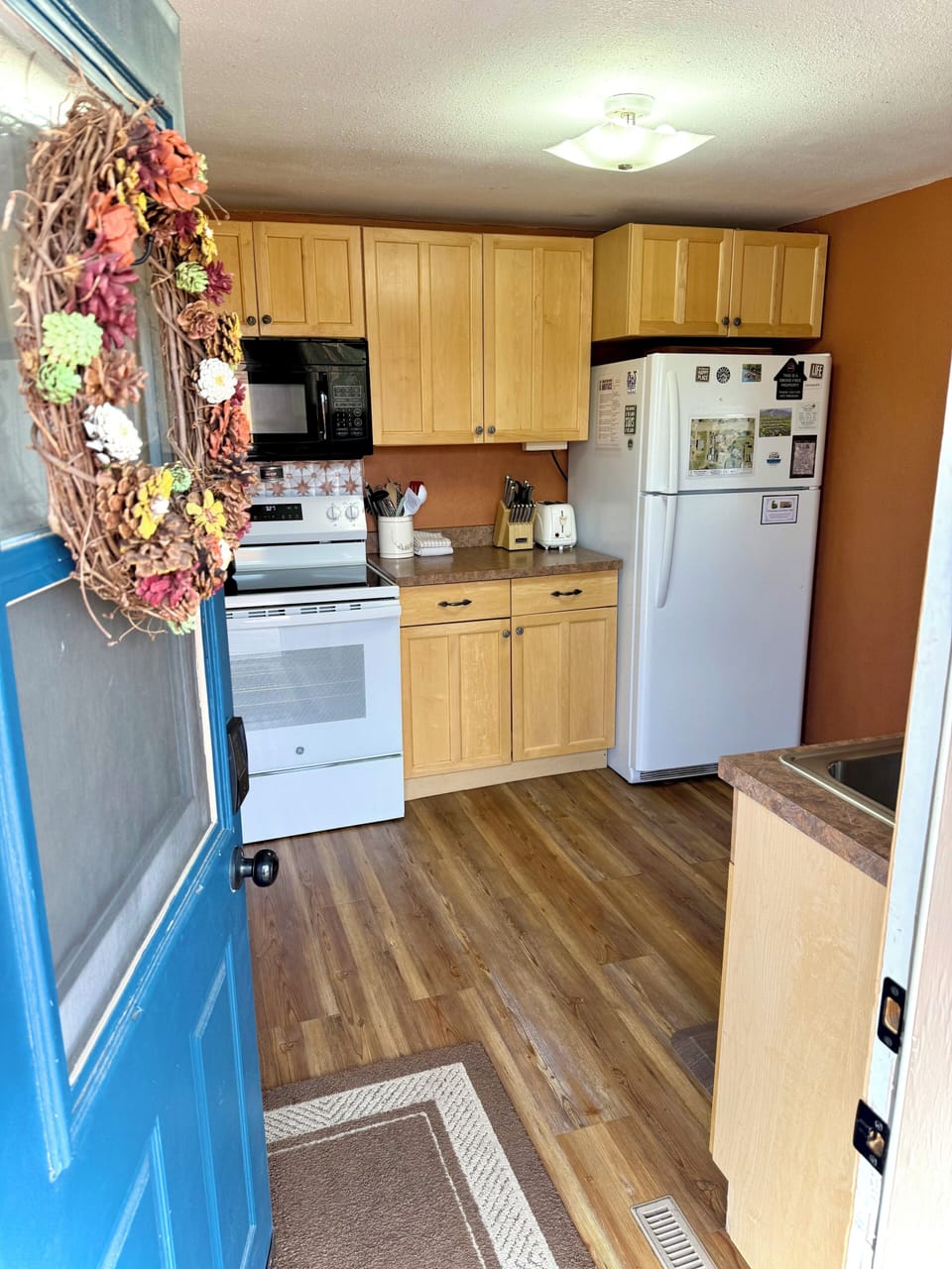 A well equipped full kitchen greets you, just begging for meals to be made.