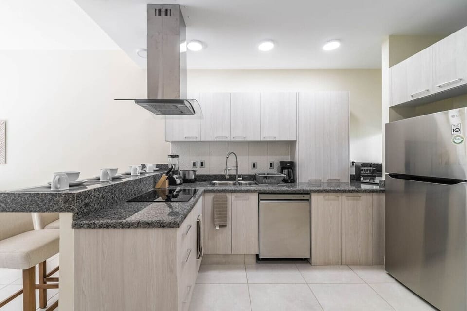Bright and inviting kitchen, featuring sleek finishes and a functional layout