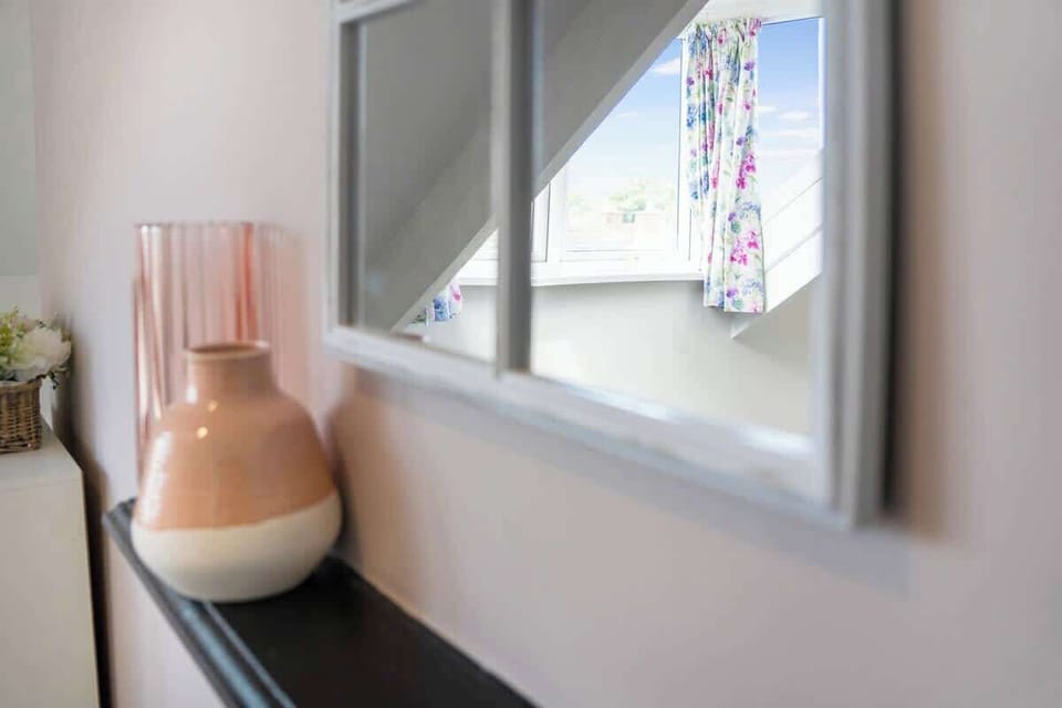 This inviting space centres around a plush double bed made for true comfort, paired with well-planned storage solutions that ensure your belongings stay organized, offering a calm, balanced setting ideal for relaxation and ease.