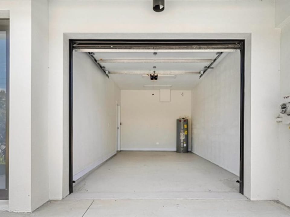 Each unit has a single garage for parking and driveway space. 