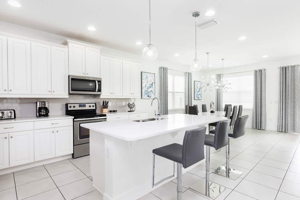 ✨ Bright & Modern Kitchen
Fully equipped and spacious, this sunny open-concept kitchen connects seamlessly to the dining area and main living room — perfect for family meals and entertaining in style!