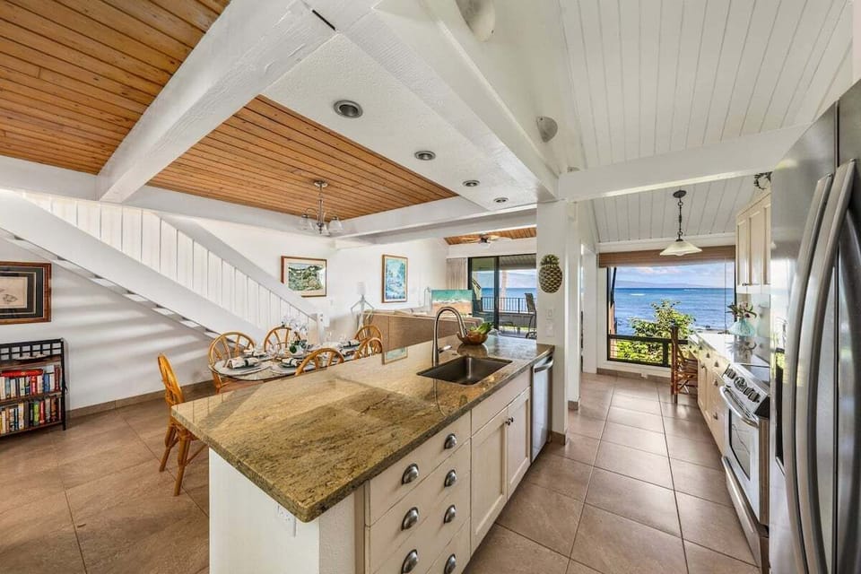 Spacious kitchen with plenty of counter space and a seamless flow into the dining area