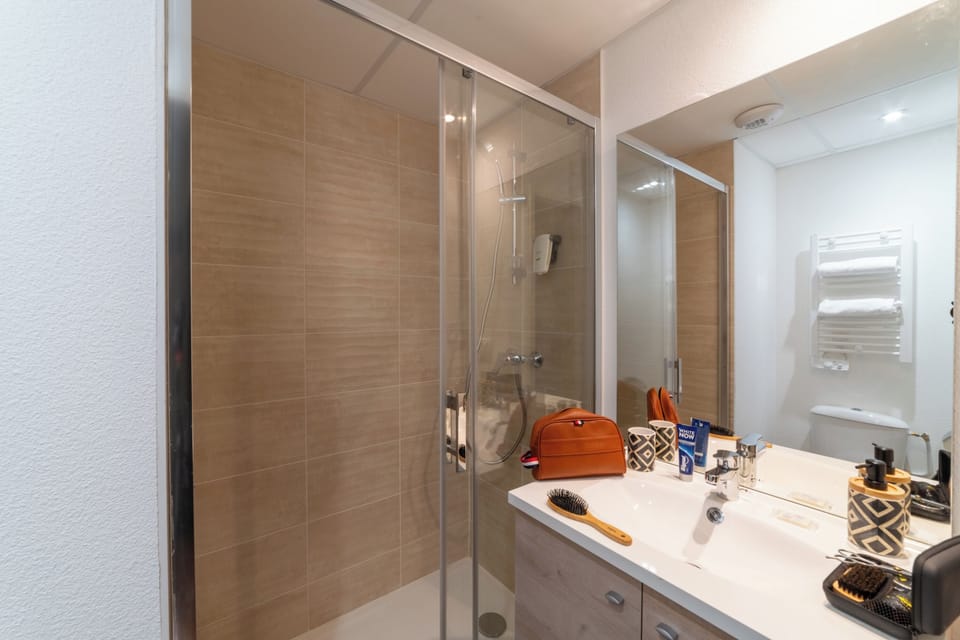 Shower, towels, soap, shampoo