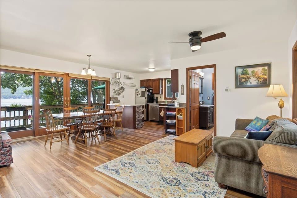 Open-concept living with stunning lake views ️ enjoy meals with a serene backdrop.